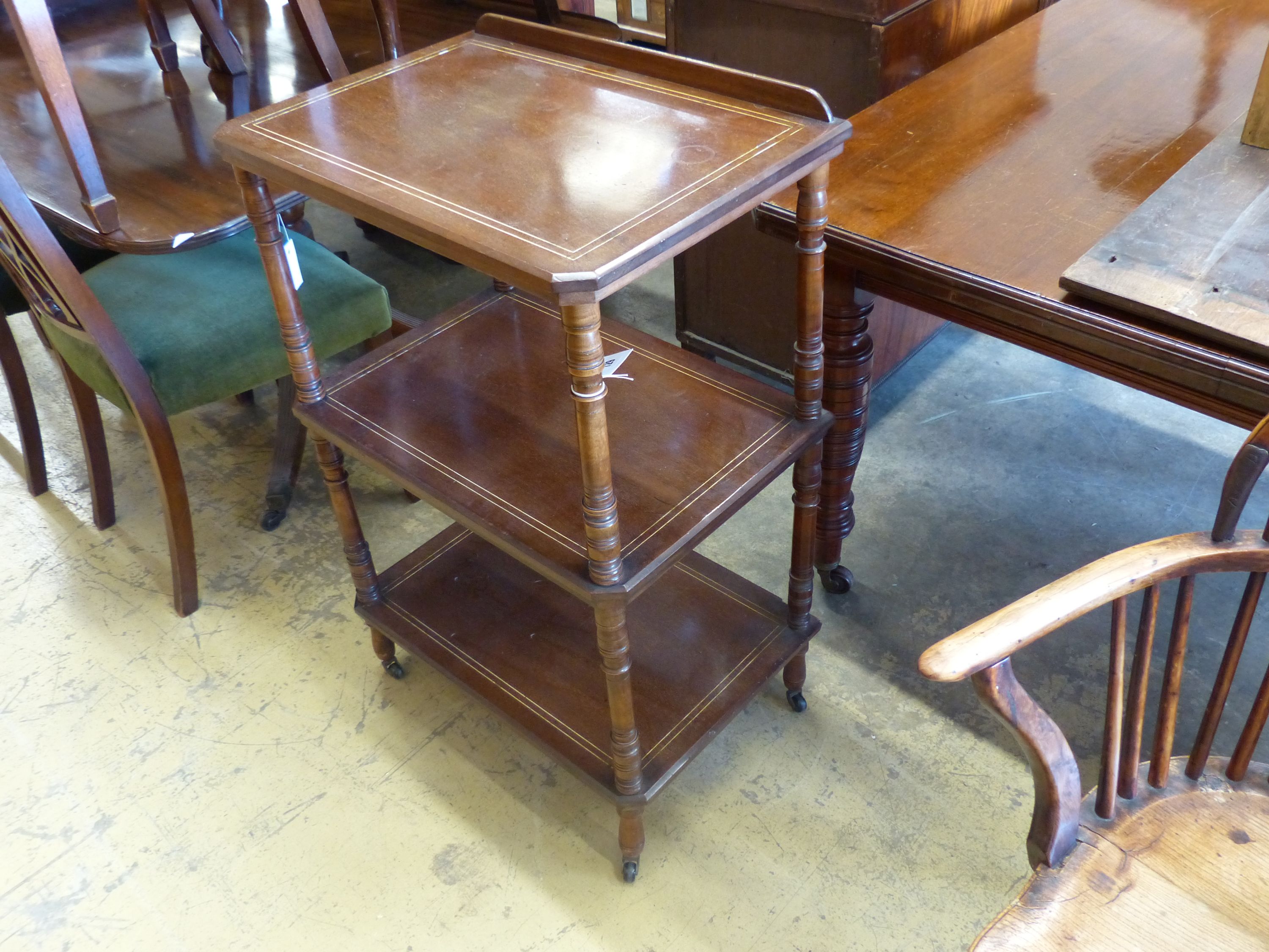 A late Victorian mahogany three tier whatnot, width 58cm, depth 41cm, height 90cm